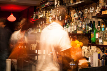 Barkeepers at work at Happiness Forgets in London